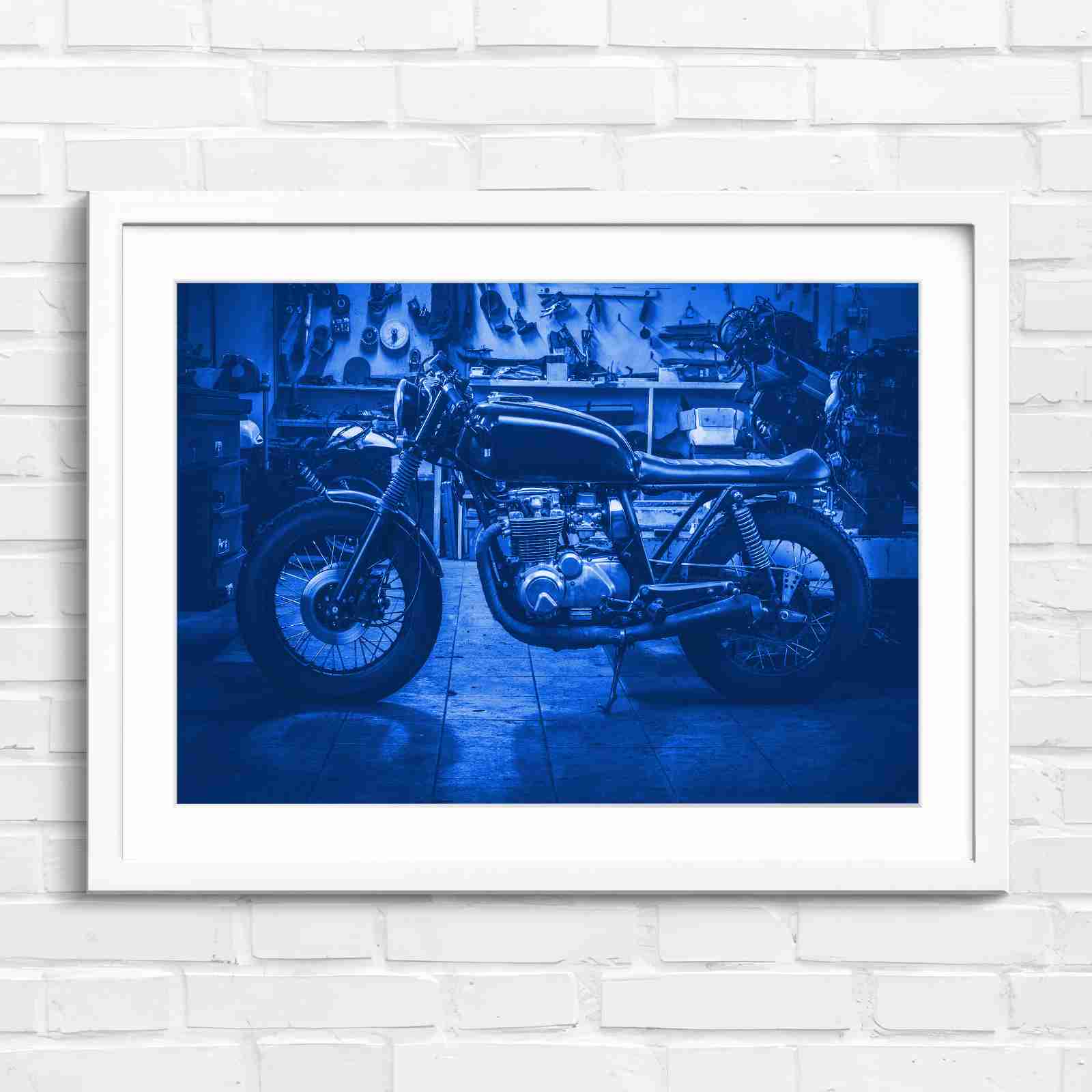 Custom Vintage Motorcycle in Workshop - Blue in White Frame
