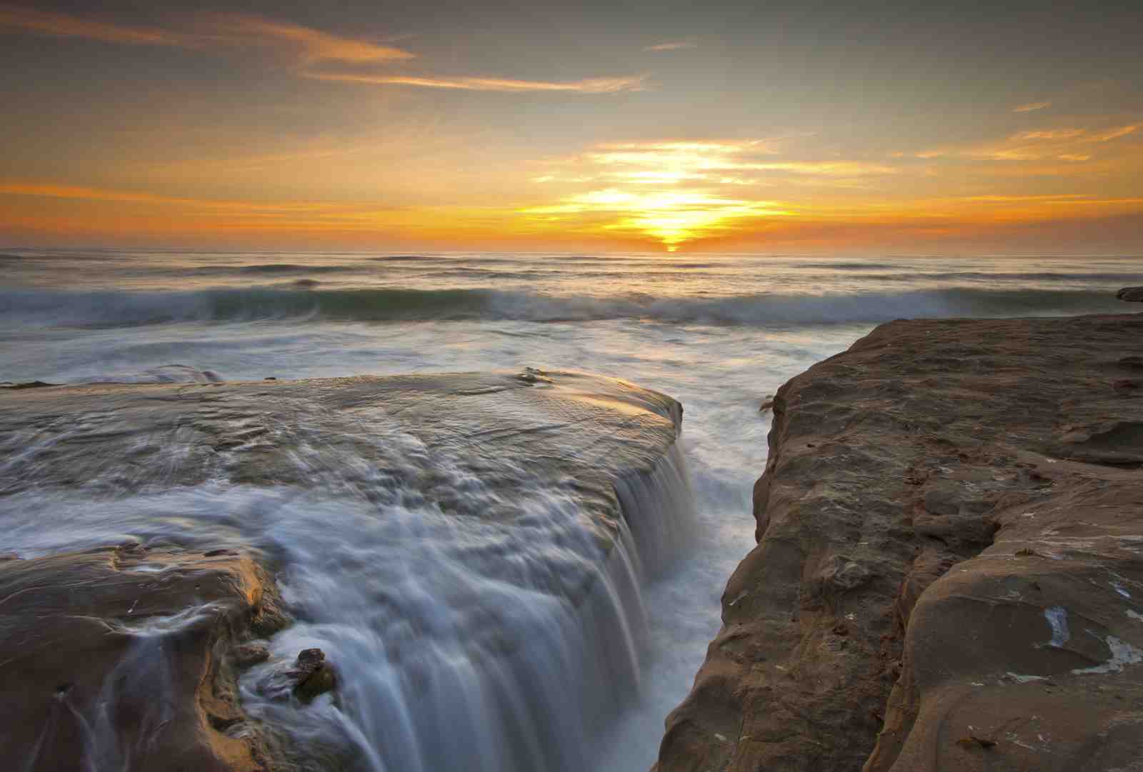 Serene Sunset Waterfall Ocean Wall Art