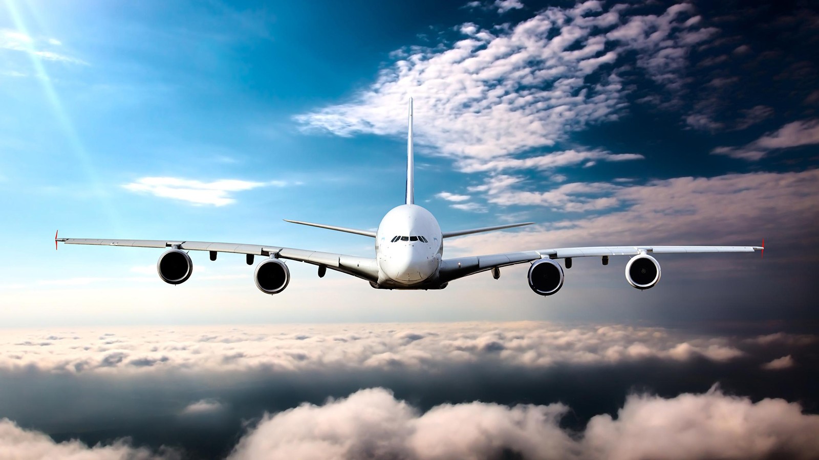 Airplane Above Clouds Wall Art