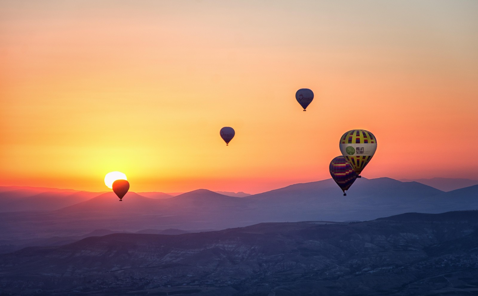 Hot Air Balloons Over Mountains Wall Art