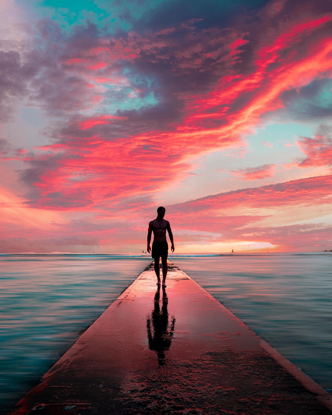 Man Walking into Sunset Wall Art
