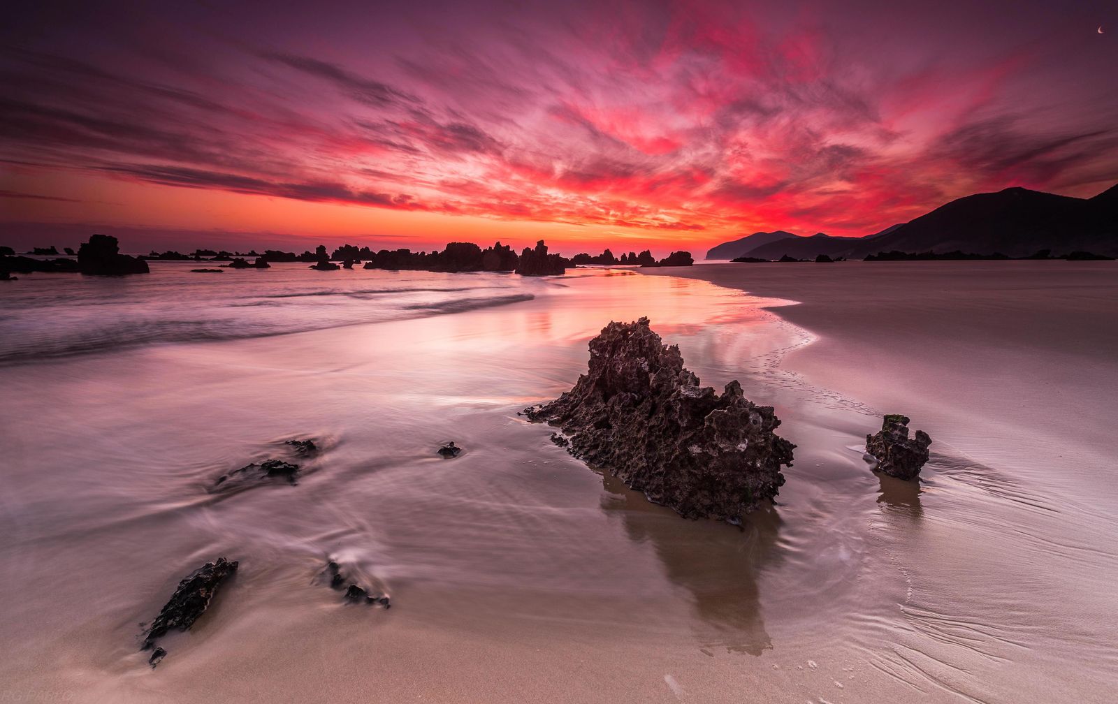 Dramatic Sunset Beach Rocks Wall Art