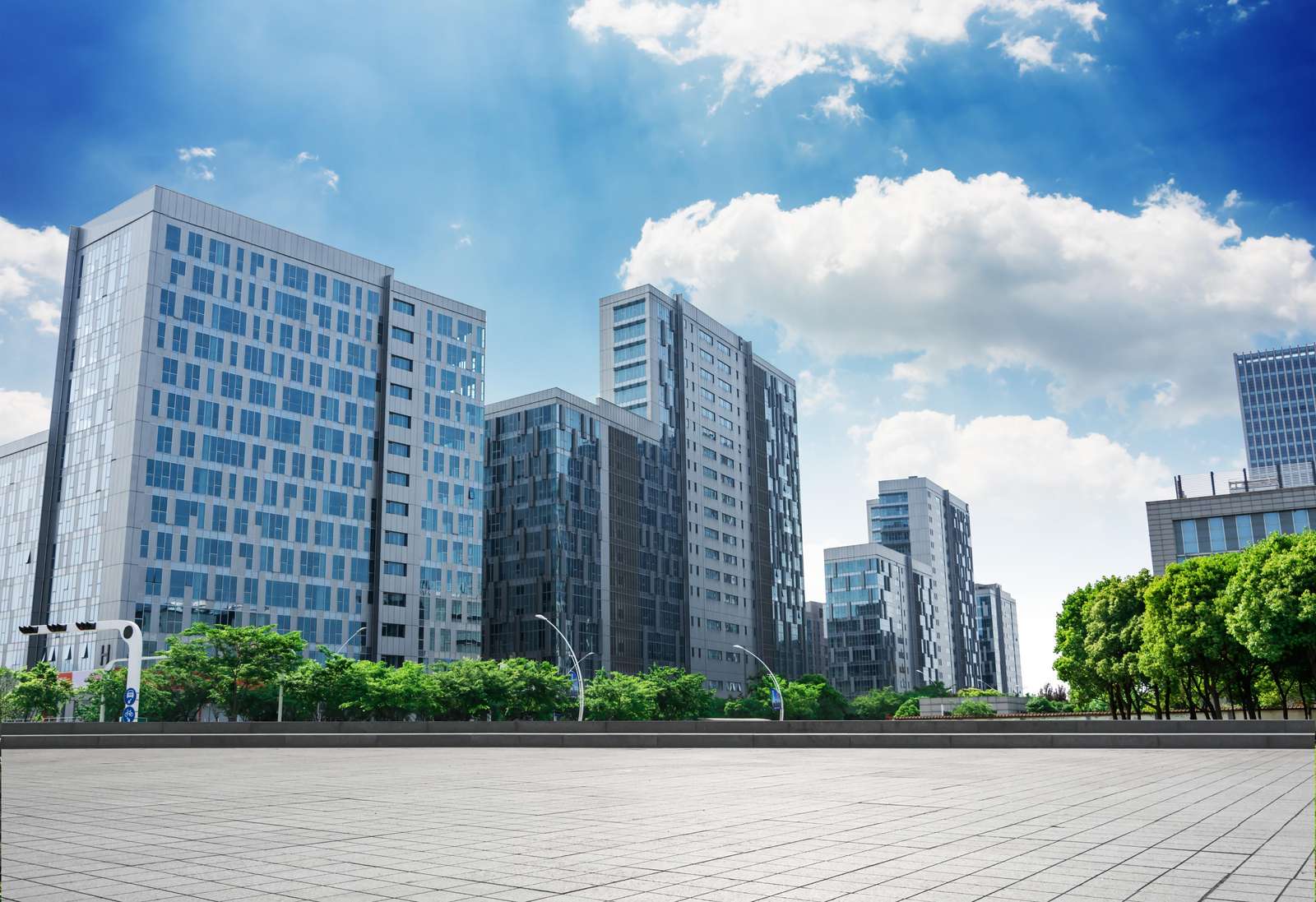 Modern Cityscape with Clouds Wall Art