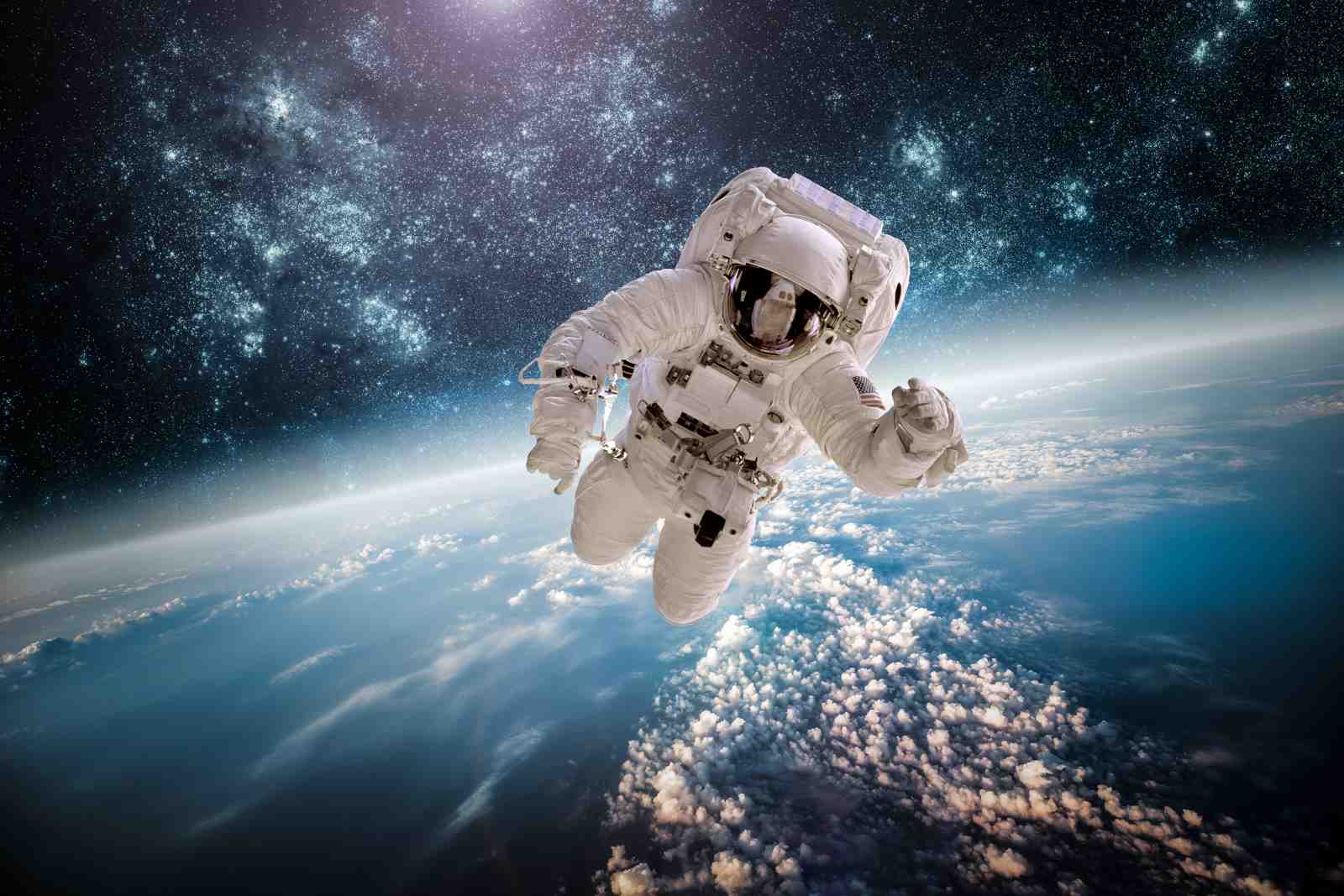 Astronaut Floating Earth Wall Art