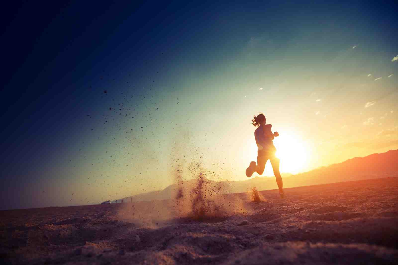 Woman Running at Sunset Motivation Wall Art