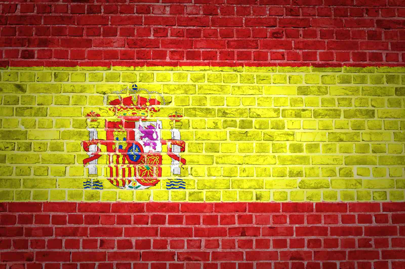 Spanish Flag Brick Wall Wall Art