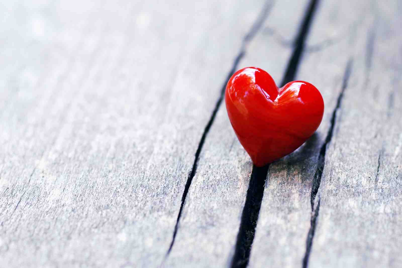 Vibrant Red Heart on Wood Grain Wall Art