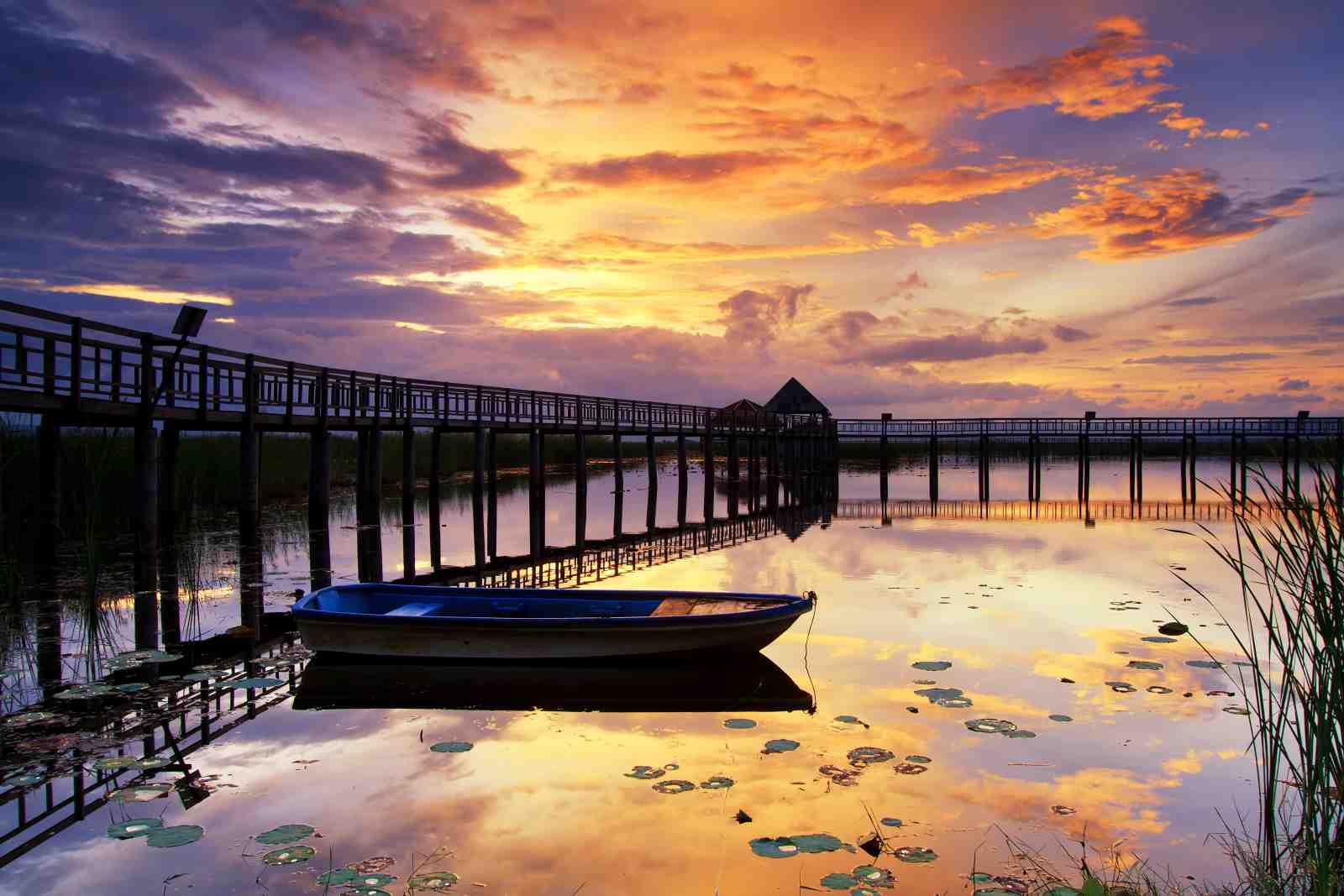 Tranquil Sunset Boat Pier Wall Art