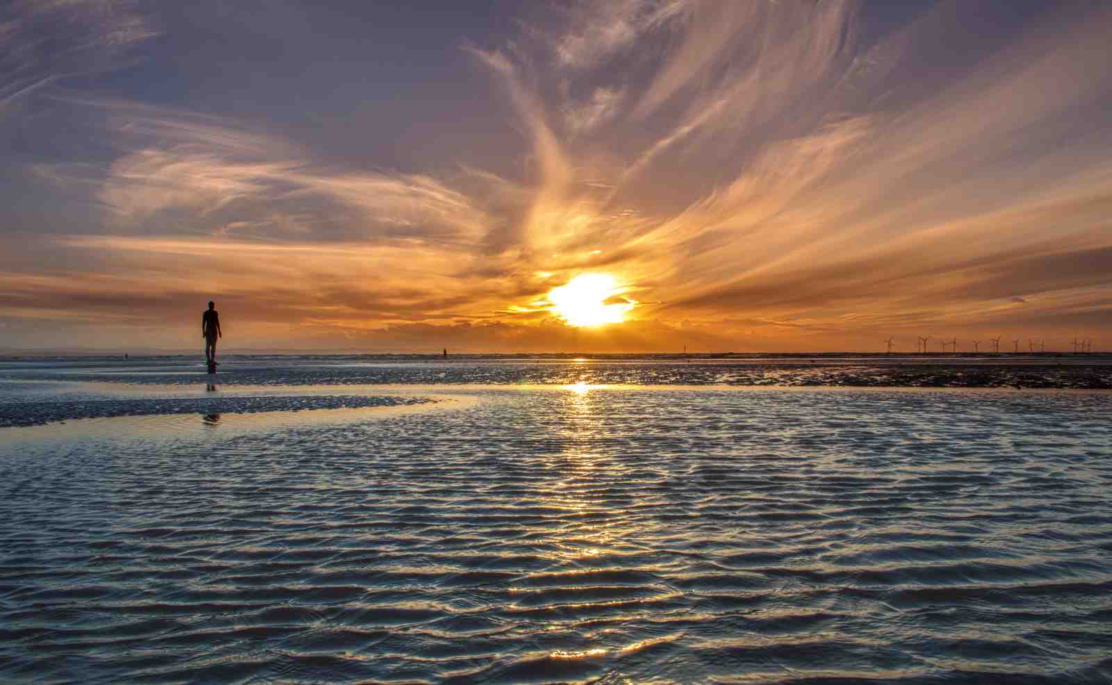 Serene Sunset Beach Figure Wall Art
