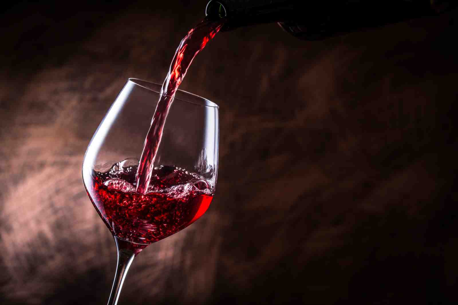 Elegant Red Wine Pour Wall Art