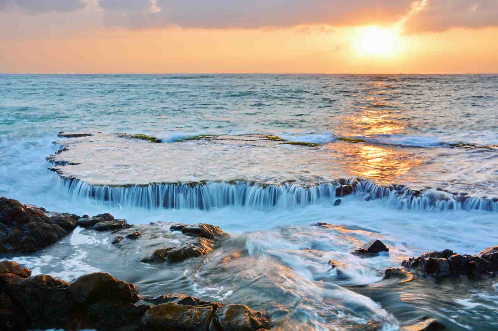Tranquil Ocean Waterfall Sunset Wall Art