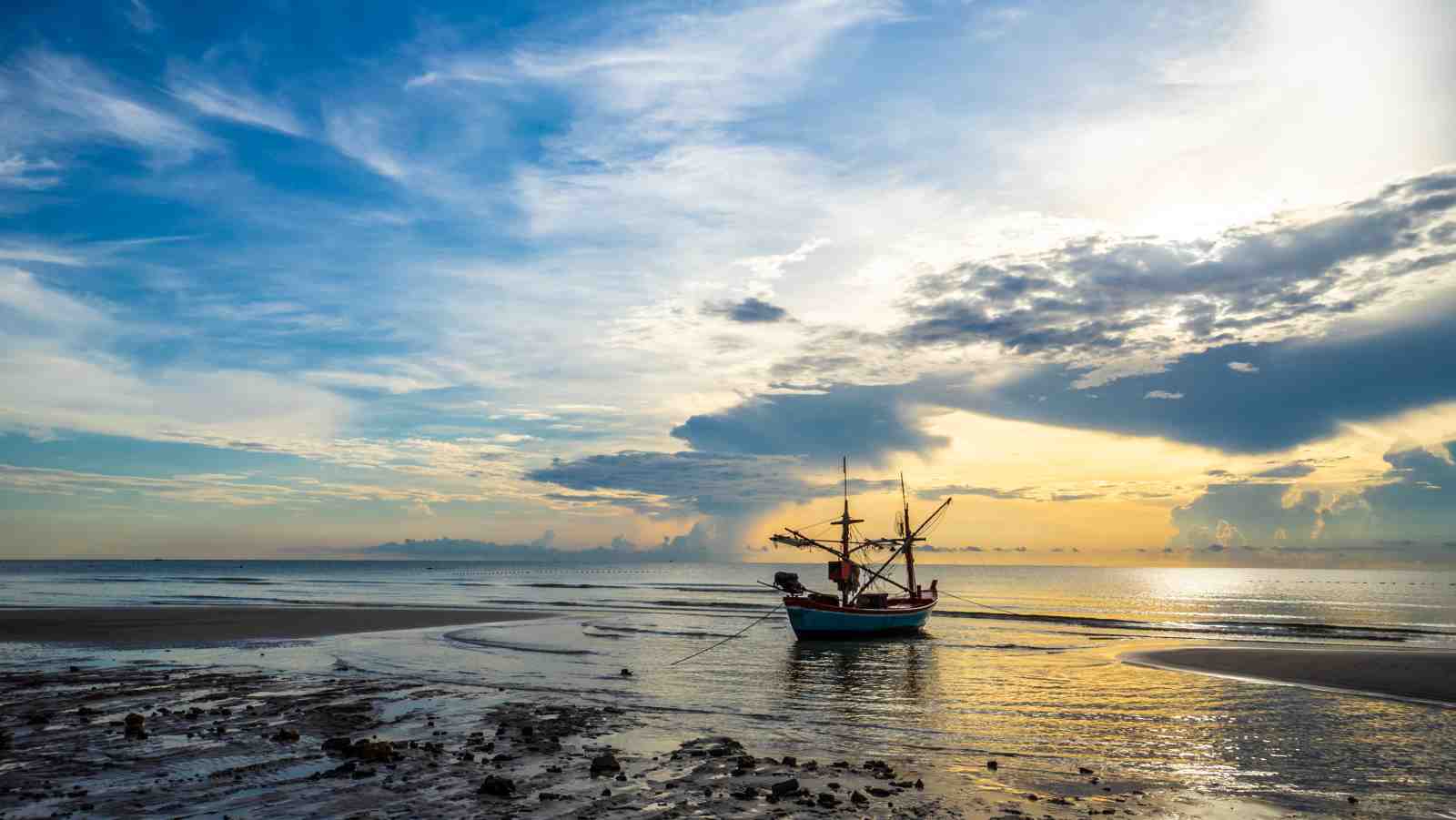 Tranquil Sunrise Fishing Boat Wall Art