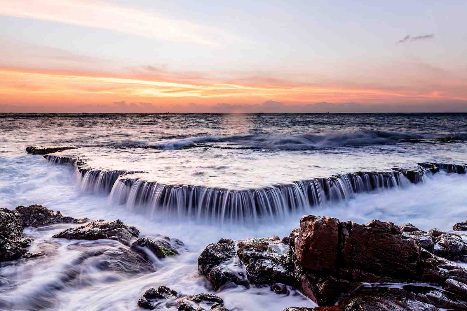 Serene Waterfall Ocean Sunset Wall Art