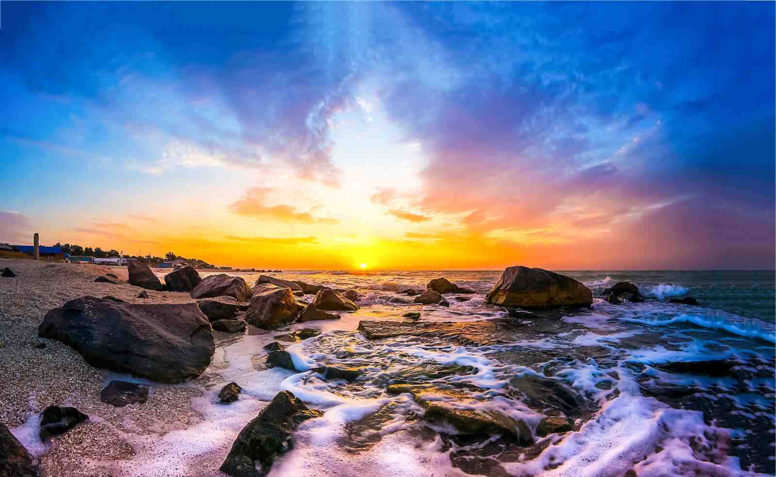 Serene Sunset Beach Rocks Wall Art