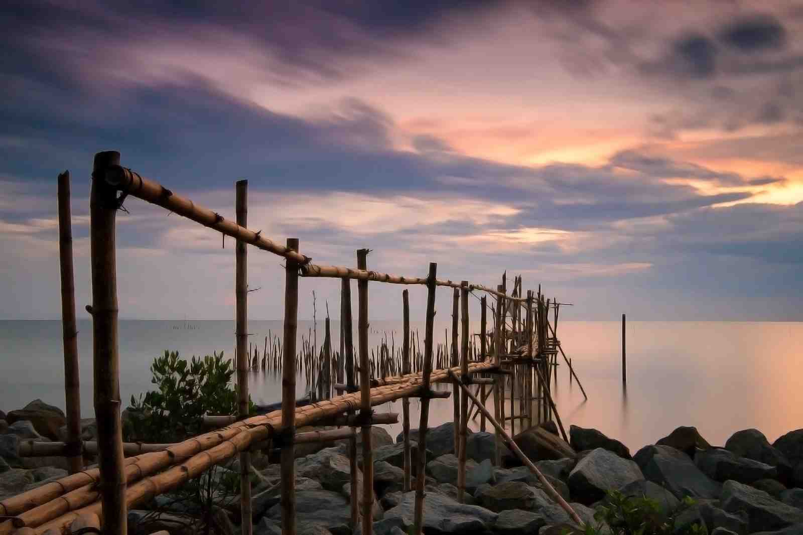 Serene Bamboo Pier Sunset Landscape Wall Art