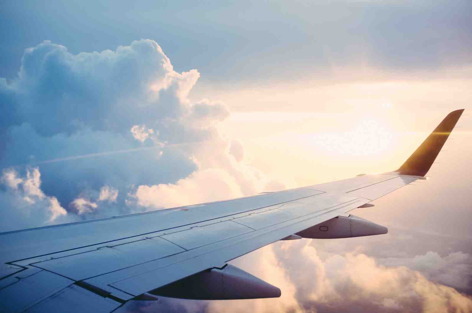 Airplane Wing Over Clouds Wall Art | Travel Art