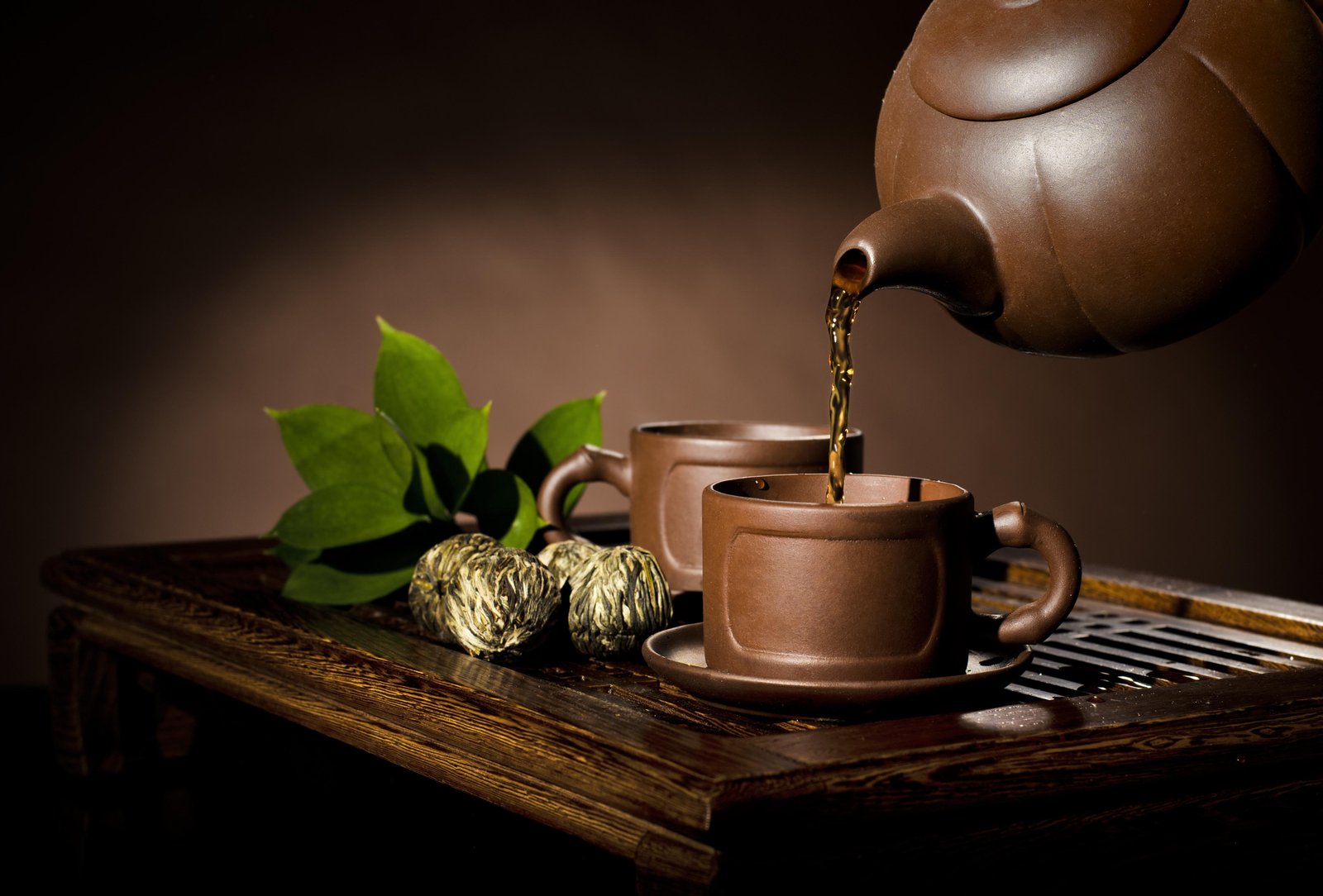 Serene Tea Ritual Brown Ceramic Wall Art